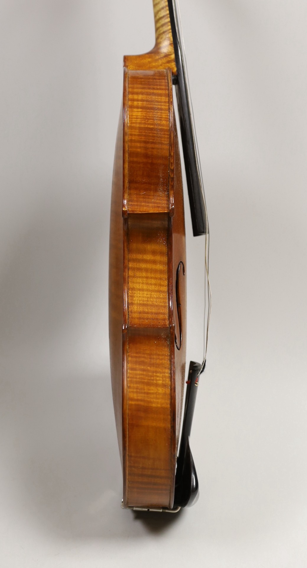 A violin, labelled Luigi Salsedo, with two bows, in case